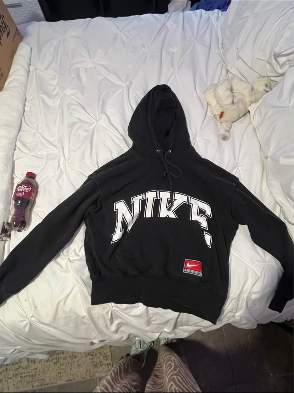 Nike Black Hoodie with White Arch Logo and Red Patch